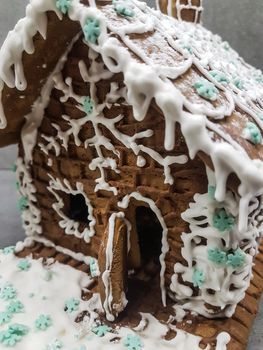 close up. beautiful gingerbread house on a light background. holidays and traditions