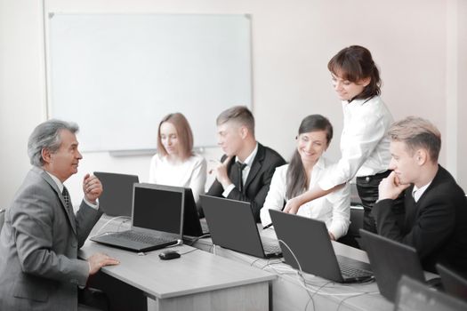 business team working on laptops in a modern office.people and technology