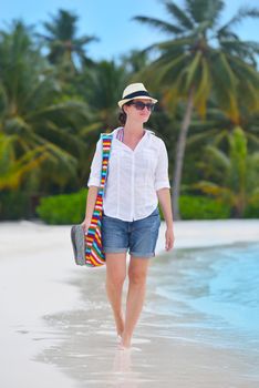 beautifel and happy woman girl on beach have fun and relax on summer vacation  over the beautiful tropical sea