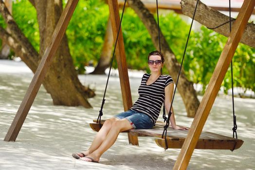 beautifel and happy woman girl on beach have fun and relax on summer vacation  over the beautiful tropical sea