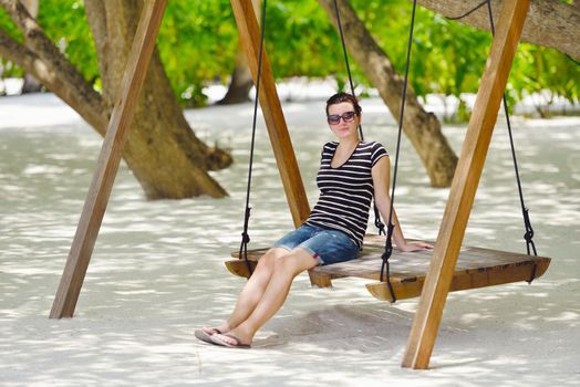 beautifel and happy woman girl on beach have fun and relax on summer vacation  over the beautiful tropical sea