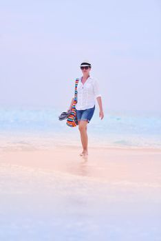 beautifel and happy woman girl on beach have fun and relax on summer vacation  over the beautiful tropical sea