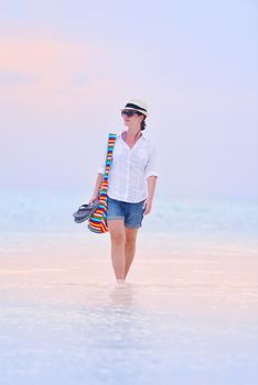 beautifel and happy woman girl on beach have fun and relax on summer vacation  over the beautiful tropical sea