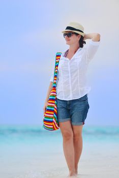 beautifel and happy woman girl on beach have fun and relax on summer vacation  over the beautiful tropical sea