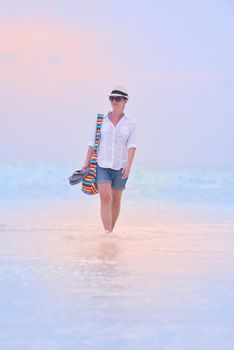 beautifel and happy woman girl on beach have fun and relax on summer vacation  over the beautiful tropical sea