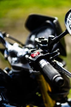 Detail of black motorcycle. Honda Hornet motorcycle detail photo in Bucharest, Romania, 2021