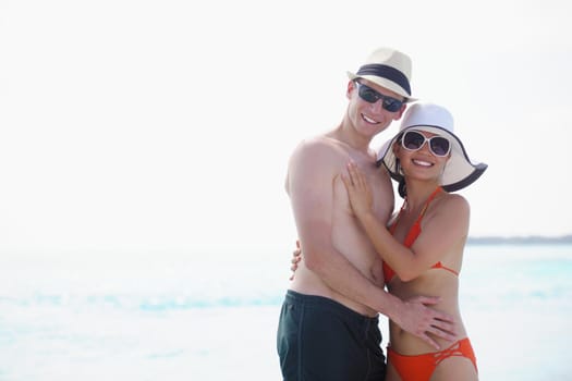 happy young romantic couple in love have fun running and relaxing on beautiful beach