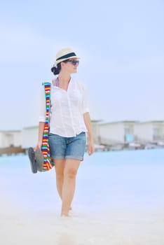 beautiful and happy woman girl on beach have fun and relax on summer vacation  over the sea