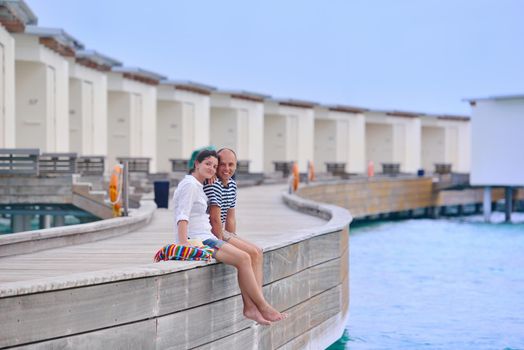 happy young romantic couple in love have fun running and relaxing on beautiful beach