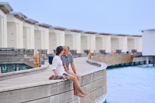 happy young romantic couple in love have fun running and relaxing on beautiful beach