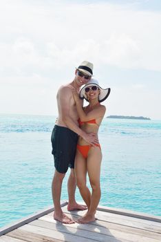 happy young romantic couple in love have fun running and relaxing on beautiful beach