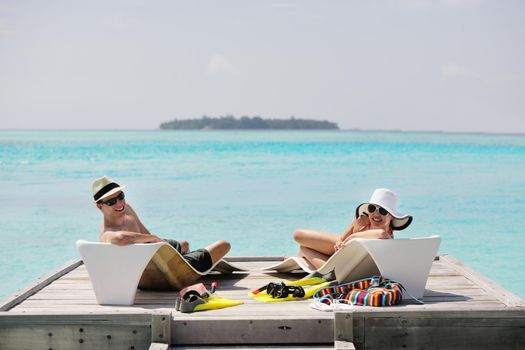 happy young romantic couple in love have fun running and relaxing on beautiful beach