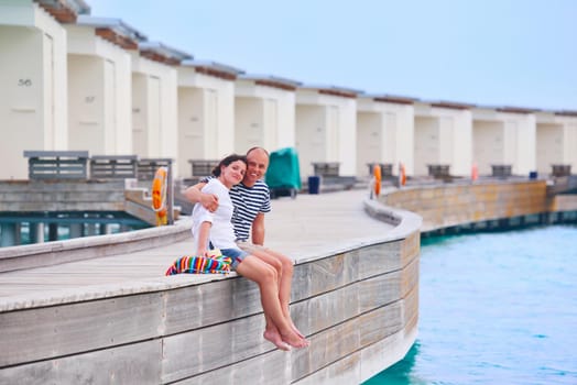 happy young romantic couple in love have fun running and relaxing on beautiful beach