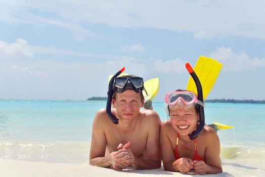 happy young romantic couple in love have fun running and relaxing on beautiful beach