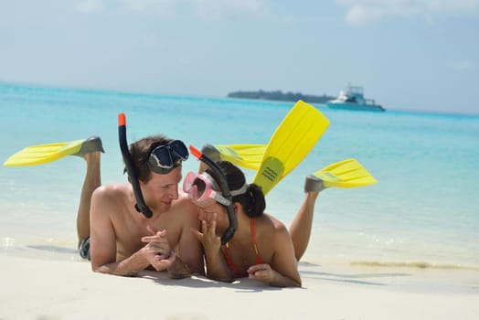 happy young romantic couple in love have fun running and relaxing on beautiful beach