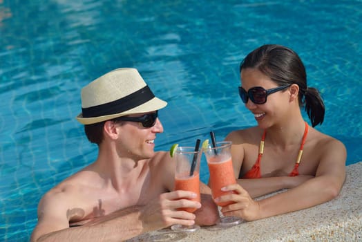 happy young romantic couple in love have fun running and relaxing on beautiful beach