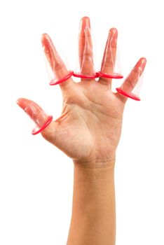 Five fingers of hand under pink condom isolated on a white background, Save clipping path. Safe sex concept.