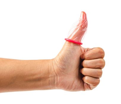 Finger under pink condom isolated on a white background, Save clipping path. Safe sex concept.