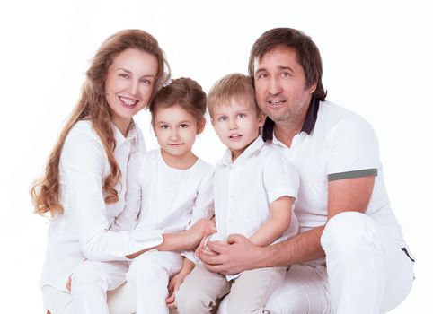 close up. happy young family .isolated on white background