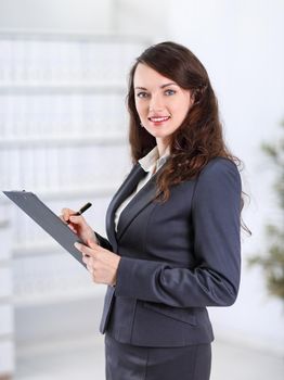 Executive's young business woman with documents .photo with copy space