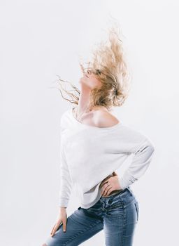 portrait of glamorous young woman in jeans. isolated on white background