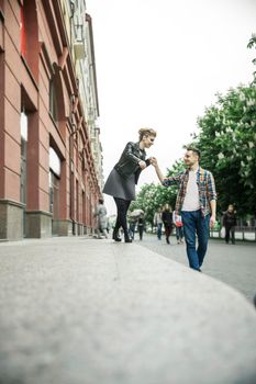 concept of happiness. loving couple on a walk in the city