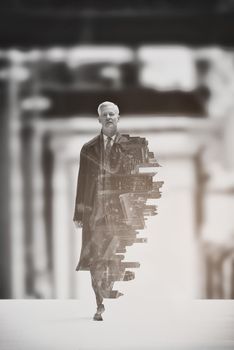 Double exposure of senior businessman in big hall