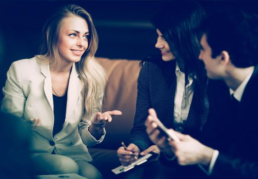 A group of successful businessmen. Discussion of the important contract