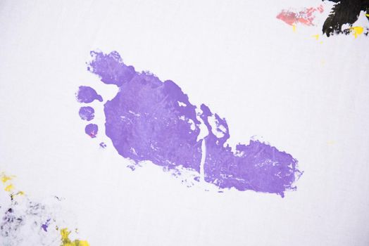 child colorful foot prints on white background