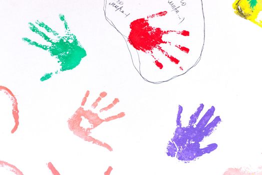 child colorful hand prints on white background