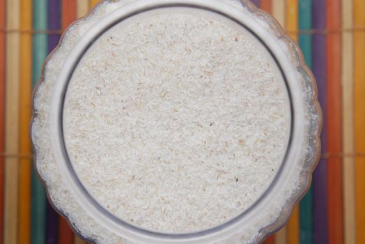 Psyllium Seeds in a container on table .