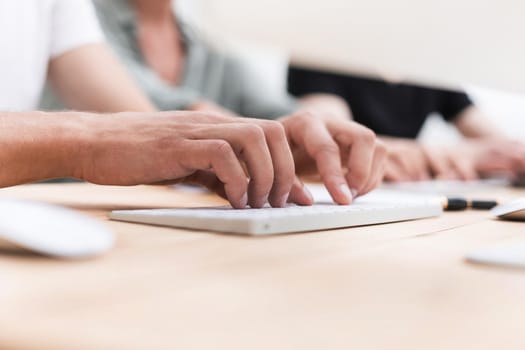 close-up. a businesswoman uses a digital tablet sitting at her Desk. people and technology