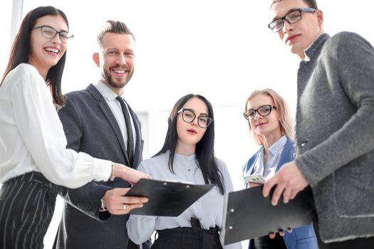 close up. successful business team with business documents. concept of success