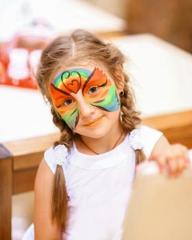 close up. little girl with animated makeover in entertainment center.