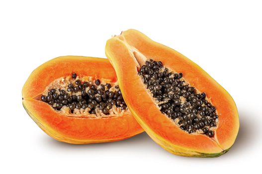 Two half ripe papaya one after another isolated on white background