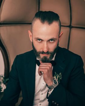 close up.portrait of a confident man in a wedding suit . people and events