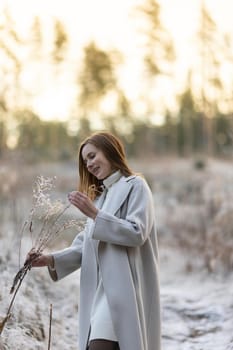 portrait of a beautiful woman on a frosty day. High quality photo