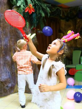 little girl playing in a children's entertainment center.holidays and events