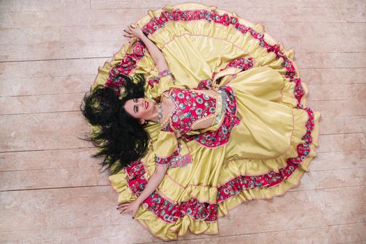 top view. beautiful young woman performing passionate Gypsy dance