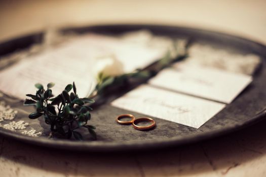 close up.wedding rings on a silver tray. holidays and events