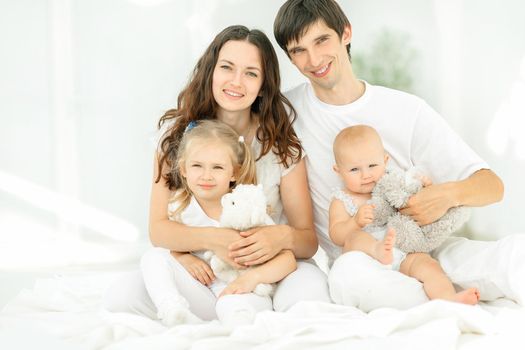 background image of a young happy family.photo with copy space