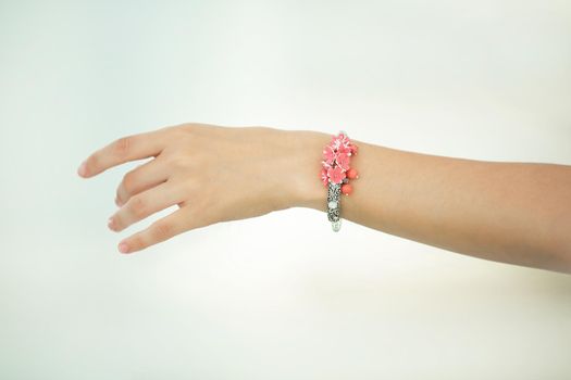 closeup.handmade bracelet on woman's hand.