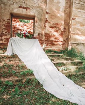 place for a romantic dinner in the ruins of an old manor. photo with copy space