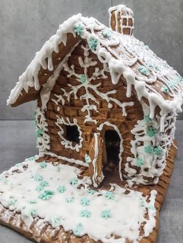 close up. beautiful gingerbread house on a light background. holidays and traditions