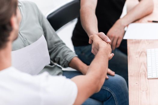 close up. welcome handshake business people in the office. business concept