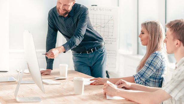 project Manager at a working meeting with the business team. the concept of teamwork