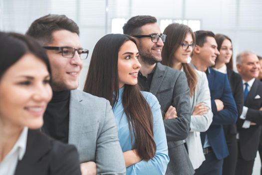 close up. professional team of business people standing together. the concept of teamwork
