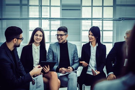 business colleagues discussing financial documents before the meeting. business concept