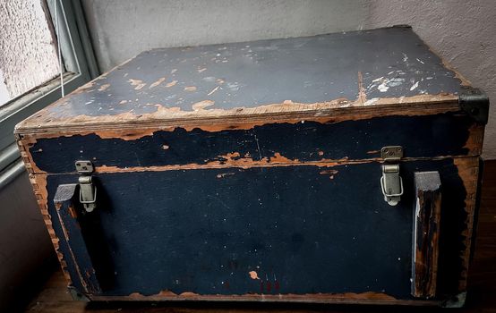 close up. an old chest on a wooden table. rarity