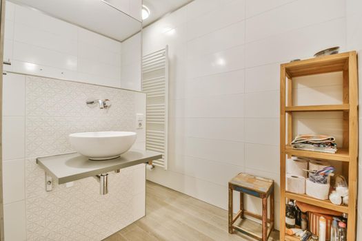 Elegant room with washbasin in luxury apartment